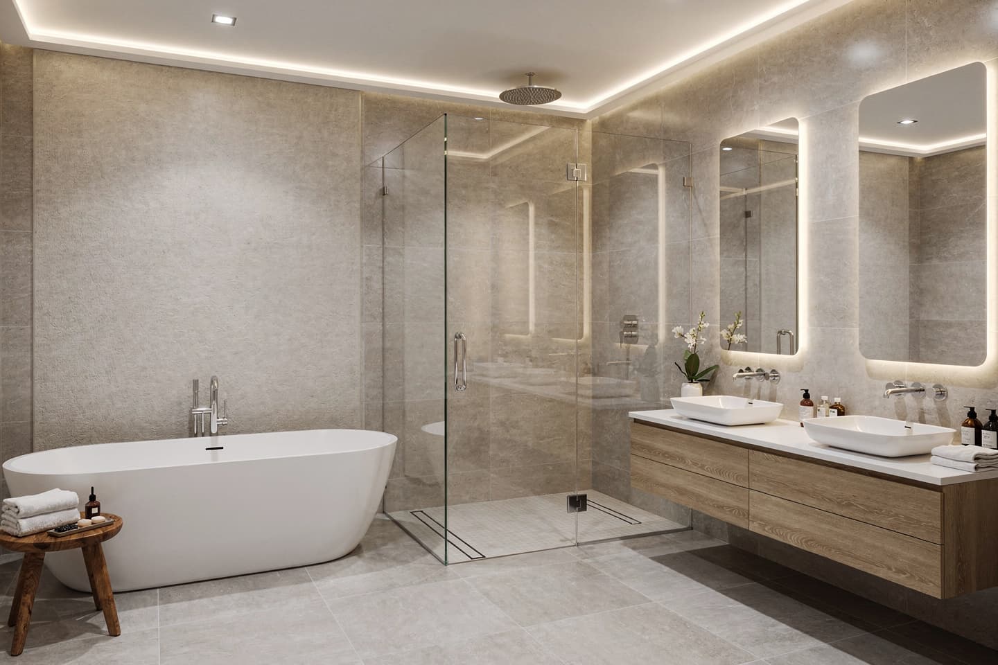 Primary bathroom with a freestanding soaking tub, a frameless glass walk-in shower with a ceiling rain head and linear drains, a floating wood double vanity with vessel sinks, backlit mirrors, and large-format gray stone-look tile